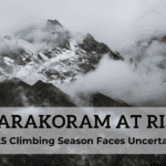 Text on a dark background reads 'KARAKORAM AT RISK' in large bold letters, with a subtitle below stating '2025 Climbing Season Faces Uncertainty.' The design conveys urgency and concern about the upcoming climbing season in the Karakoram mountain range.