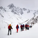 People hiking on Snow Covered Mountain