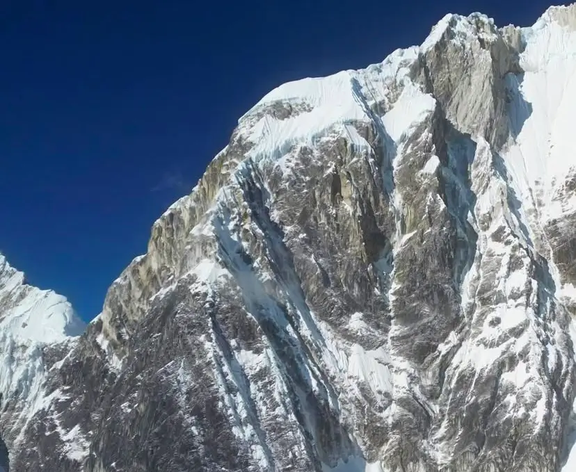 a close-up view of the rugged, icy mountain terrain.